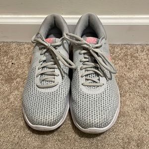 Nike size 8 color grey with pink swoosh